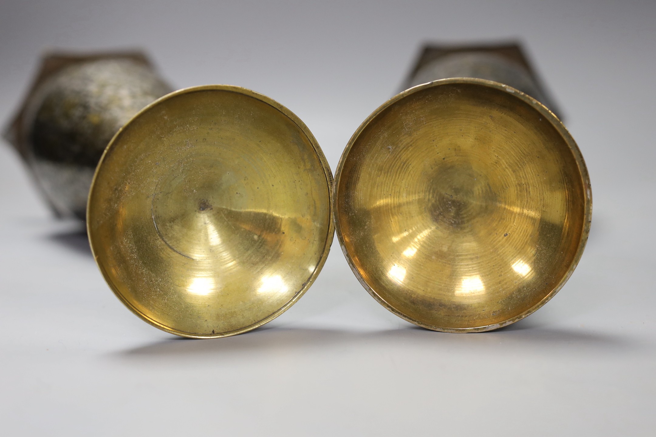 A pair of Indian damascened brass vases and a similar vase, pair of vases 33cms high